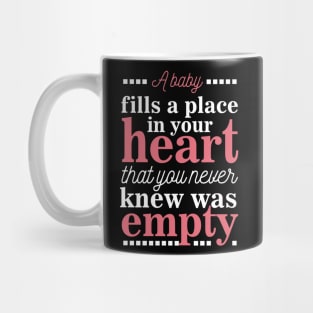 A baby fills a place in your heart Mug